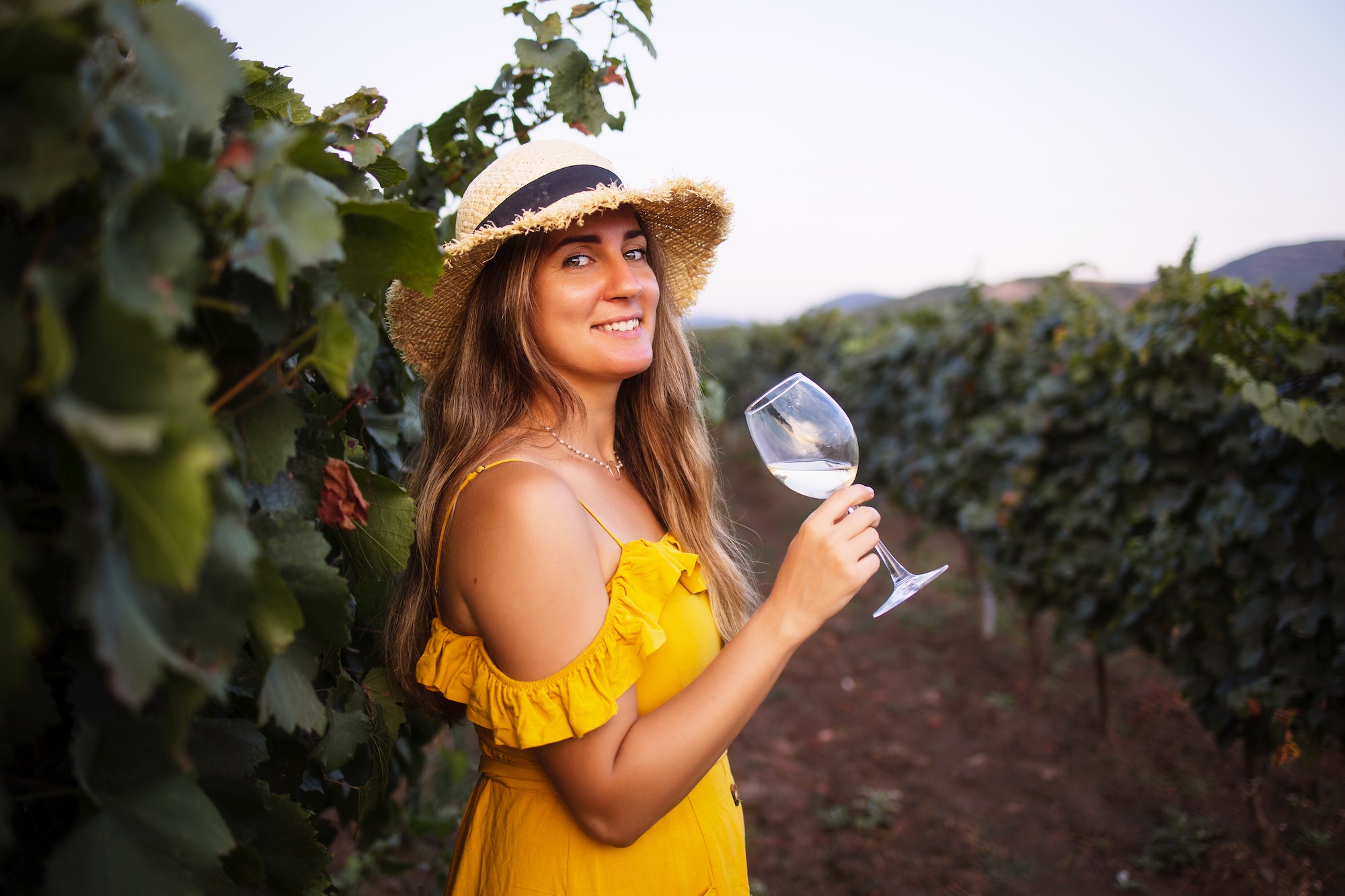 Female hand with glass of wine